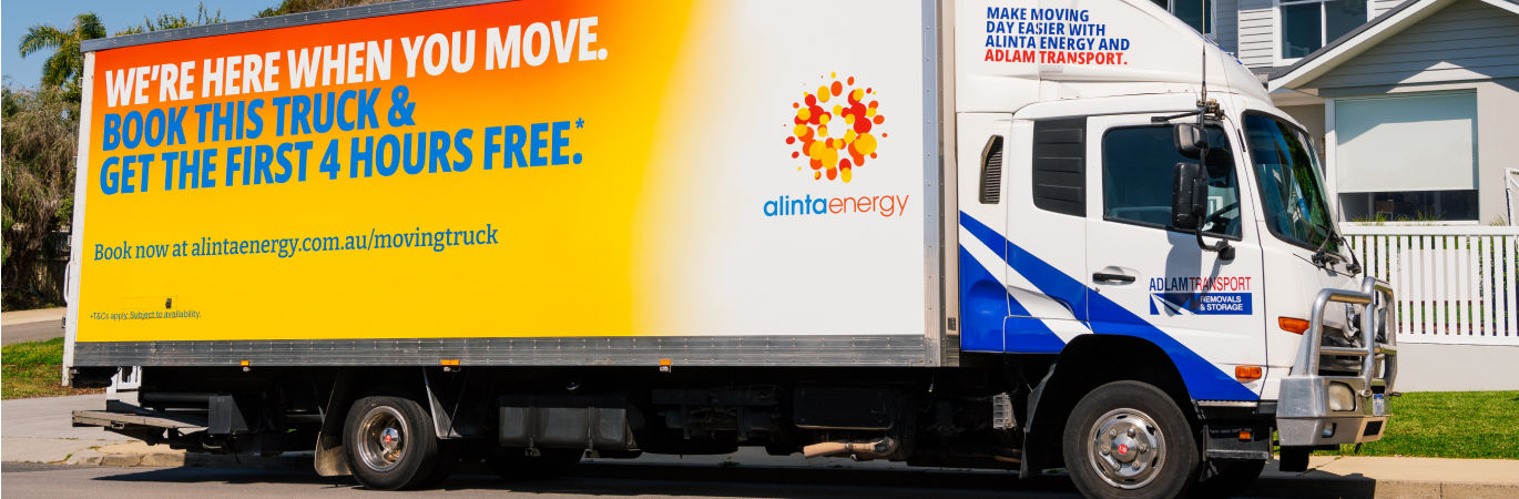 Large Adlam Transport removal truck with Alinta Energy imagery on the side